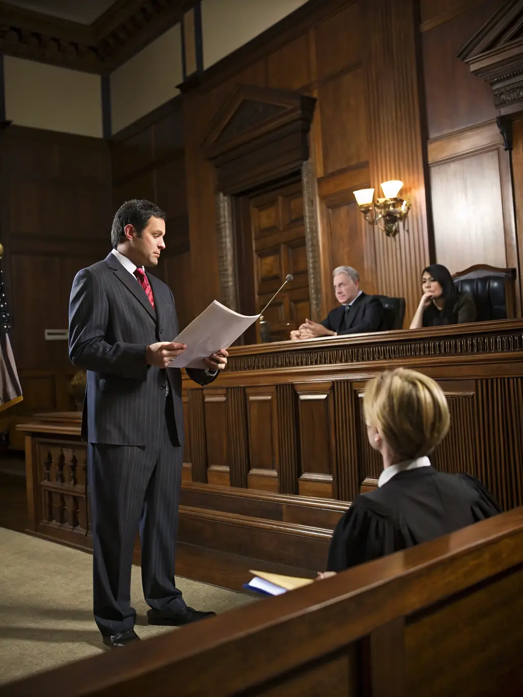 A courtroom scene depicting the defense against a builder's lien claim, showcasing the firm's litigation skills and commitment to protecting clients' interests.